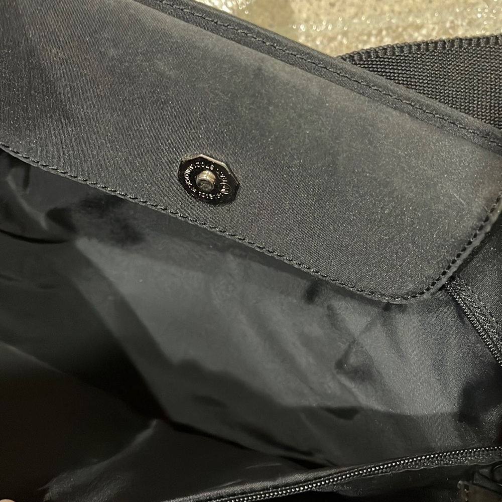 Old Navy Black nylon tote bag. Great pockets and compartments. Sturdy Strap - Picture 10 of 12